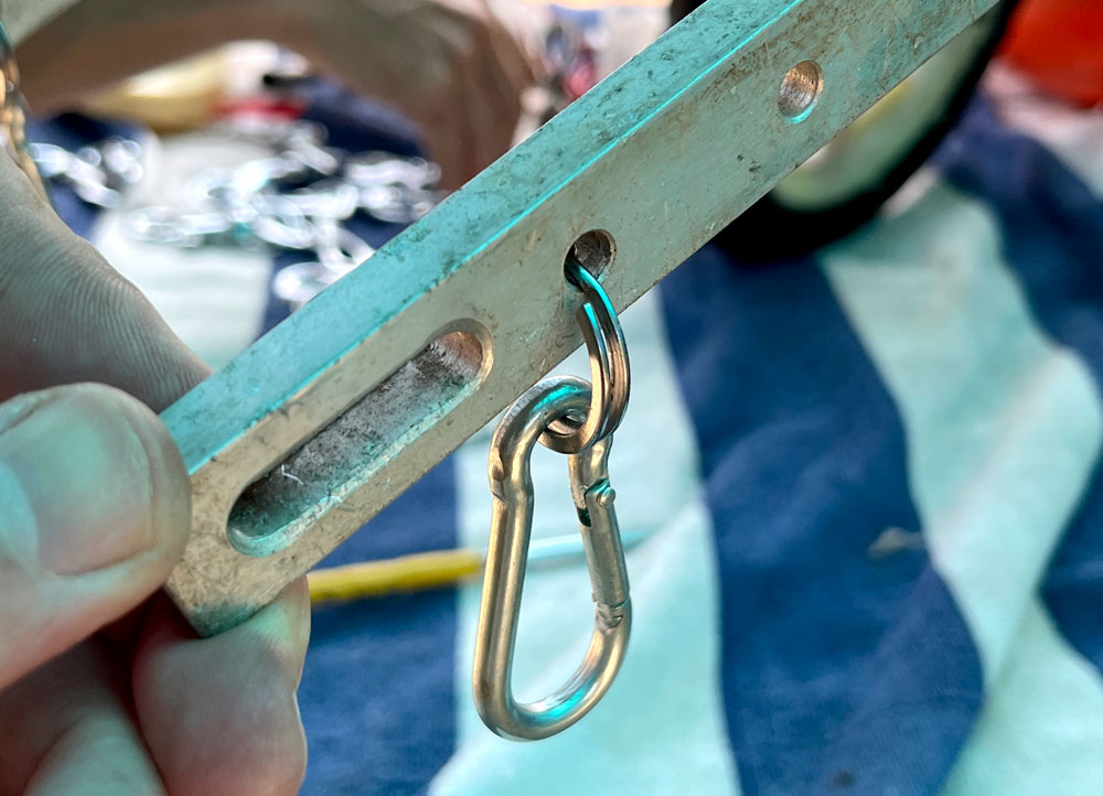 Using a carabineer secured with a keyring for the front harness